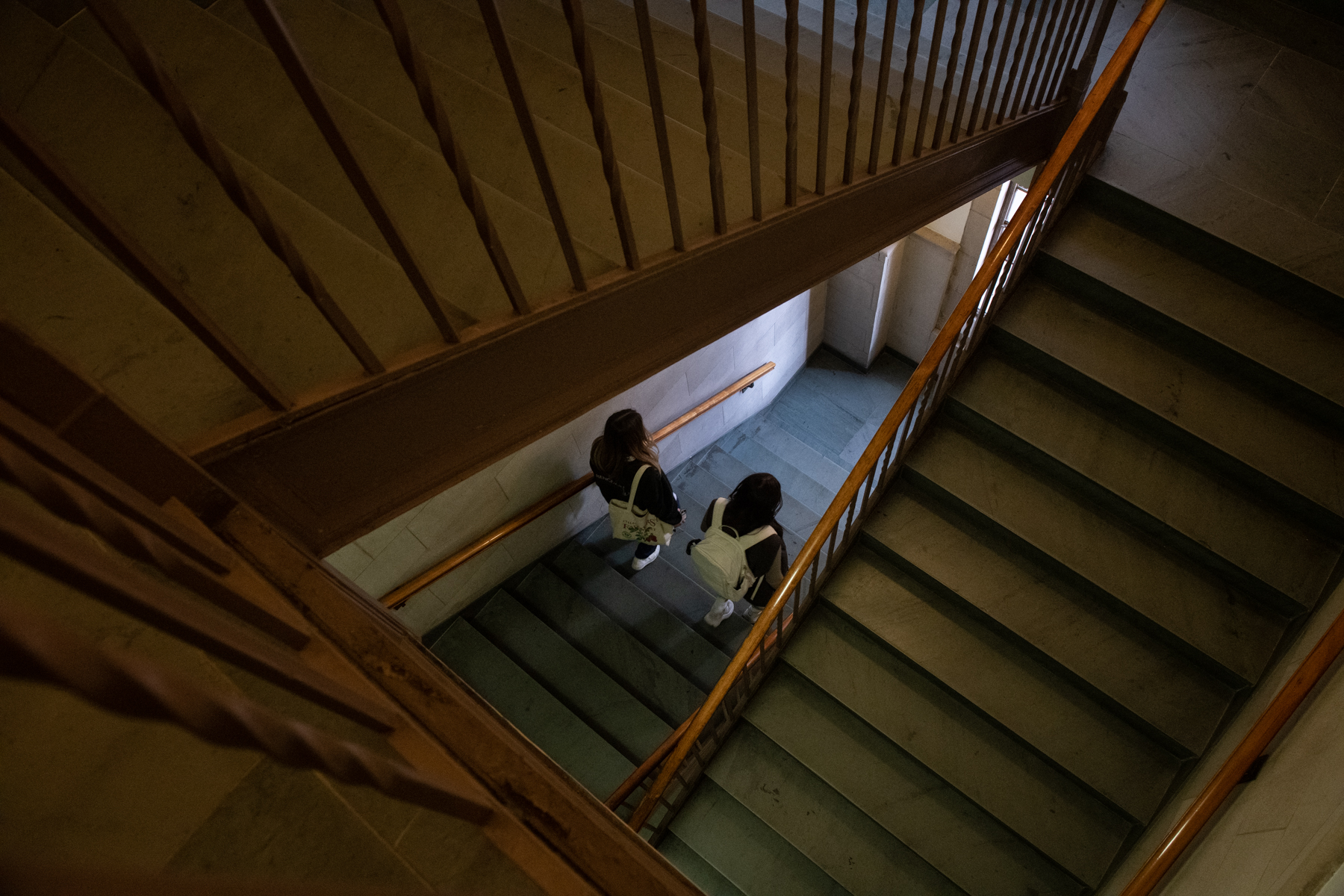 People walk down a stairwell in the University of Pittsburgh’s Cathedral of Learning, Tuesday, Oct. 18, 2022, in Oakland.