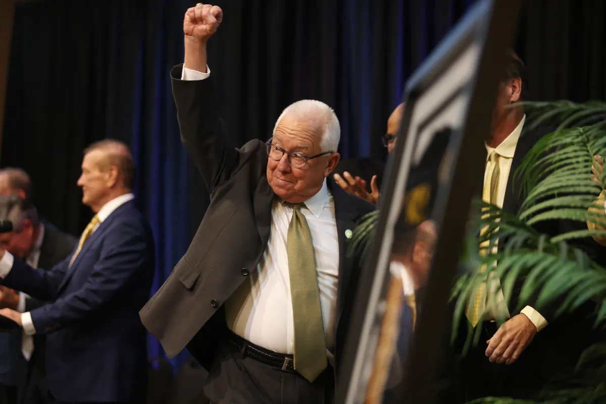 Joseph S. Paul reacts to applause from the audience