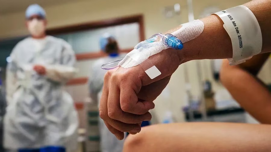 A patient is prepared for admission at a hospital